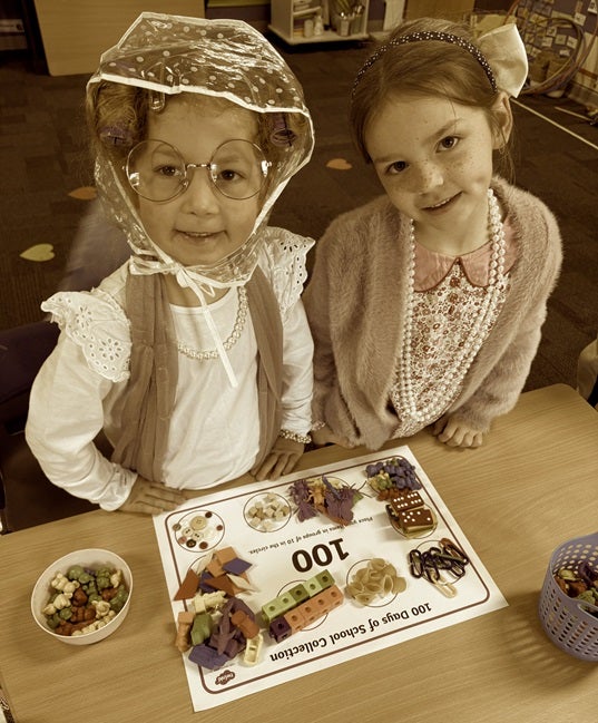 Two students on dressed up on 100 days of kindy.