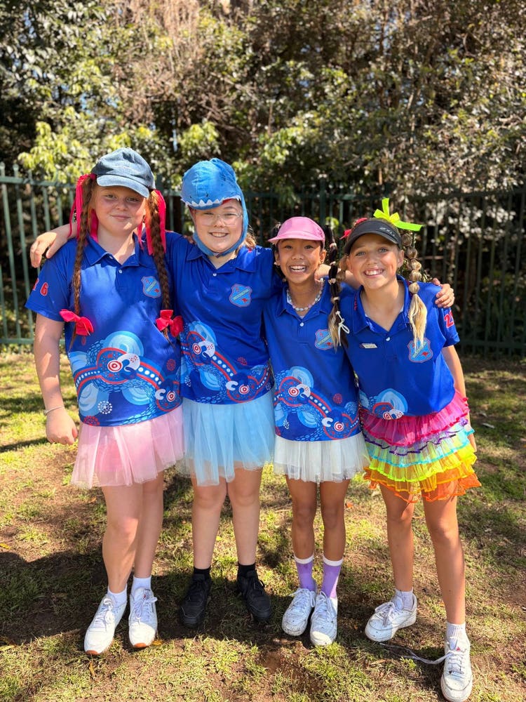 Students dressed colourfully for a school event.